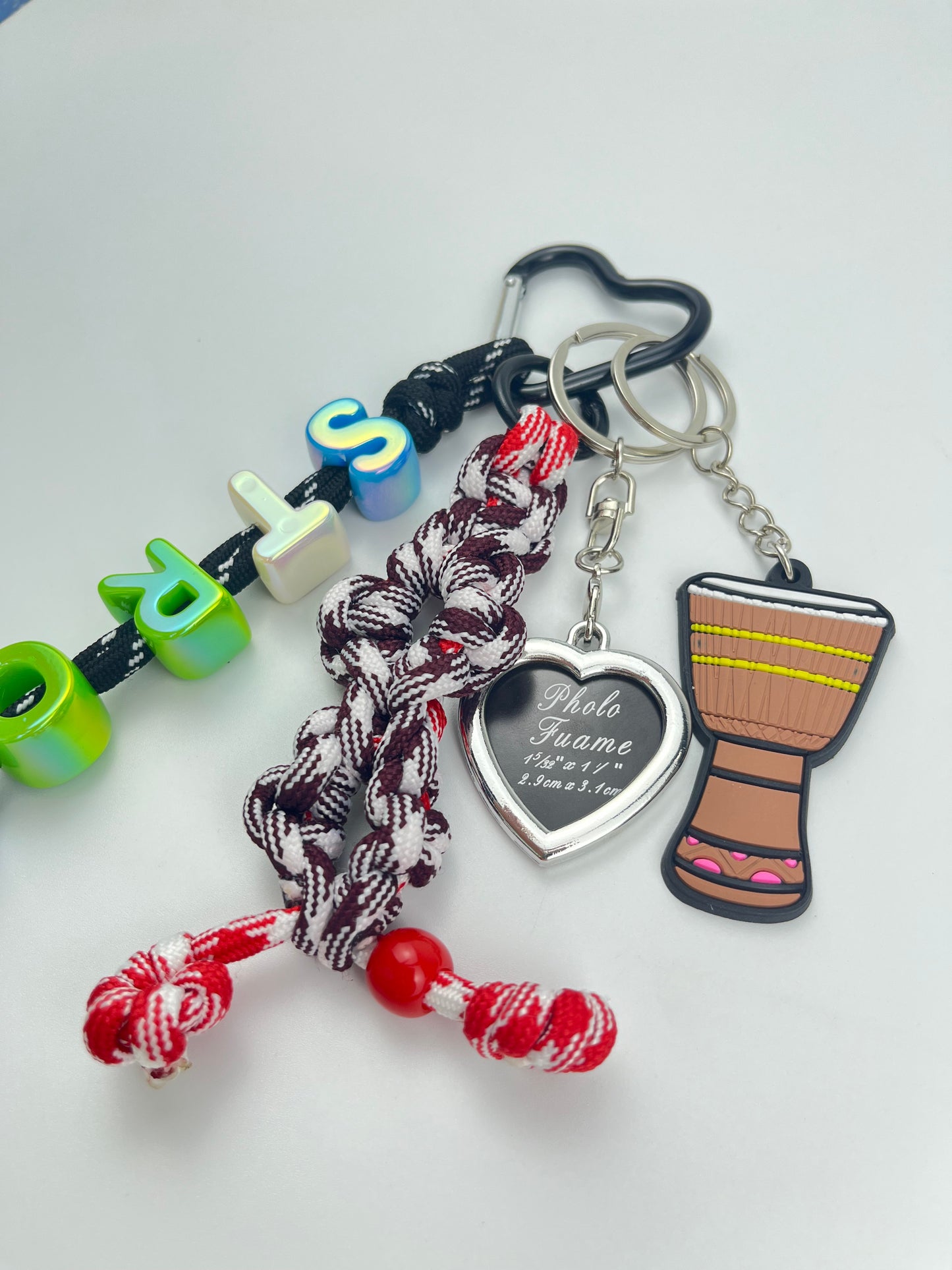 Colorful "STRONG" Music - Themed Keychain: Drum & Heart Charms