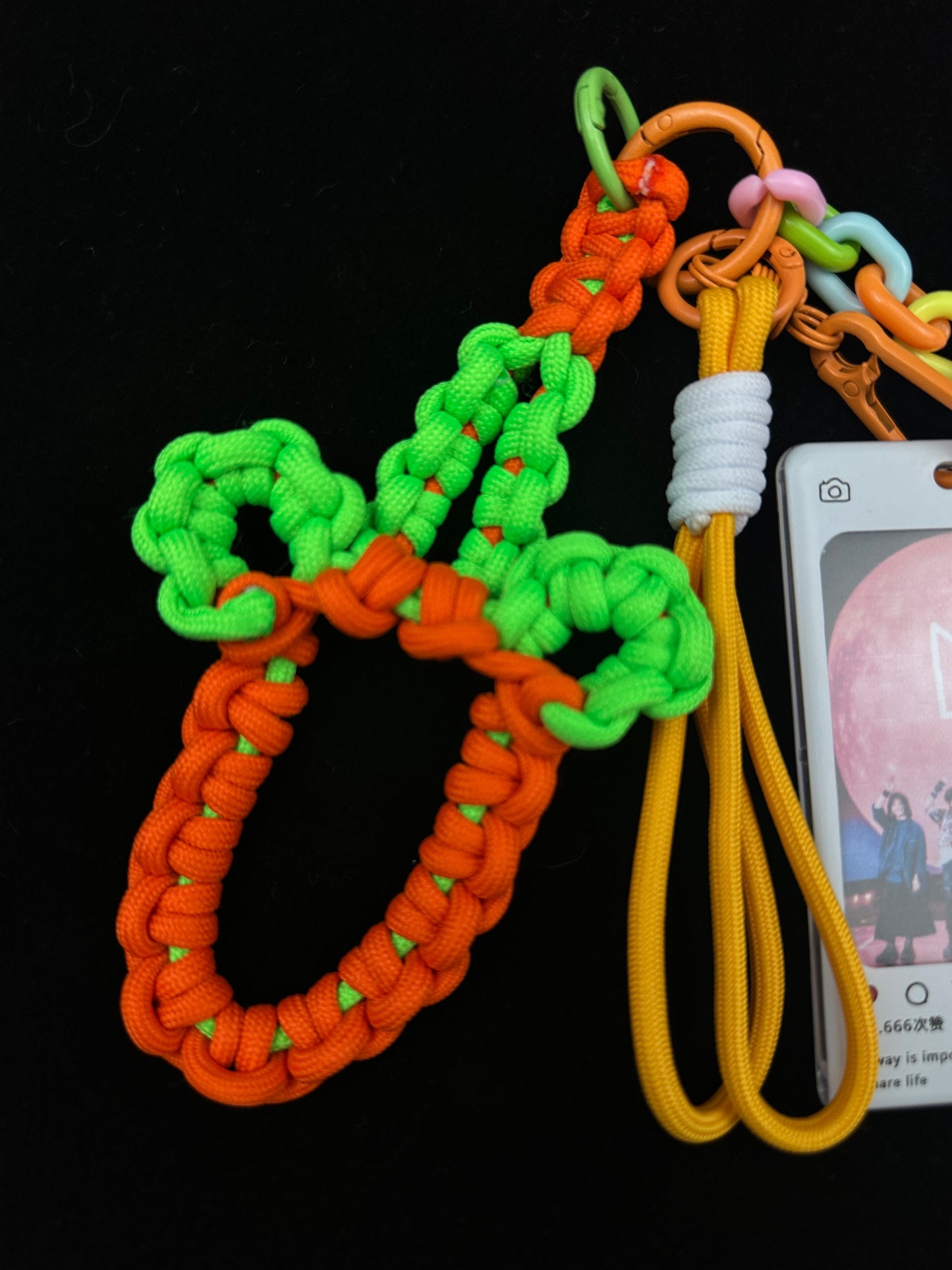 Colorful paracord keychain size reference with coin — SHENG