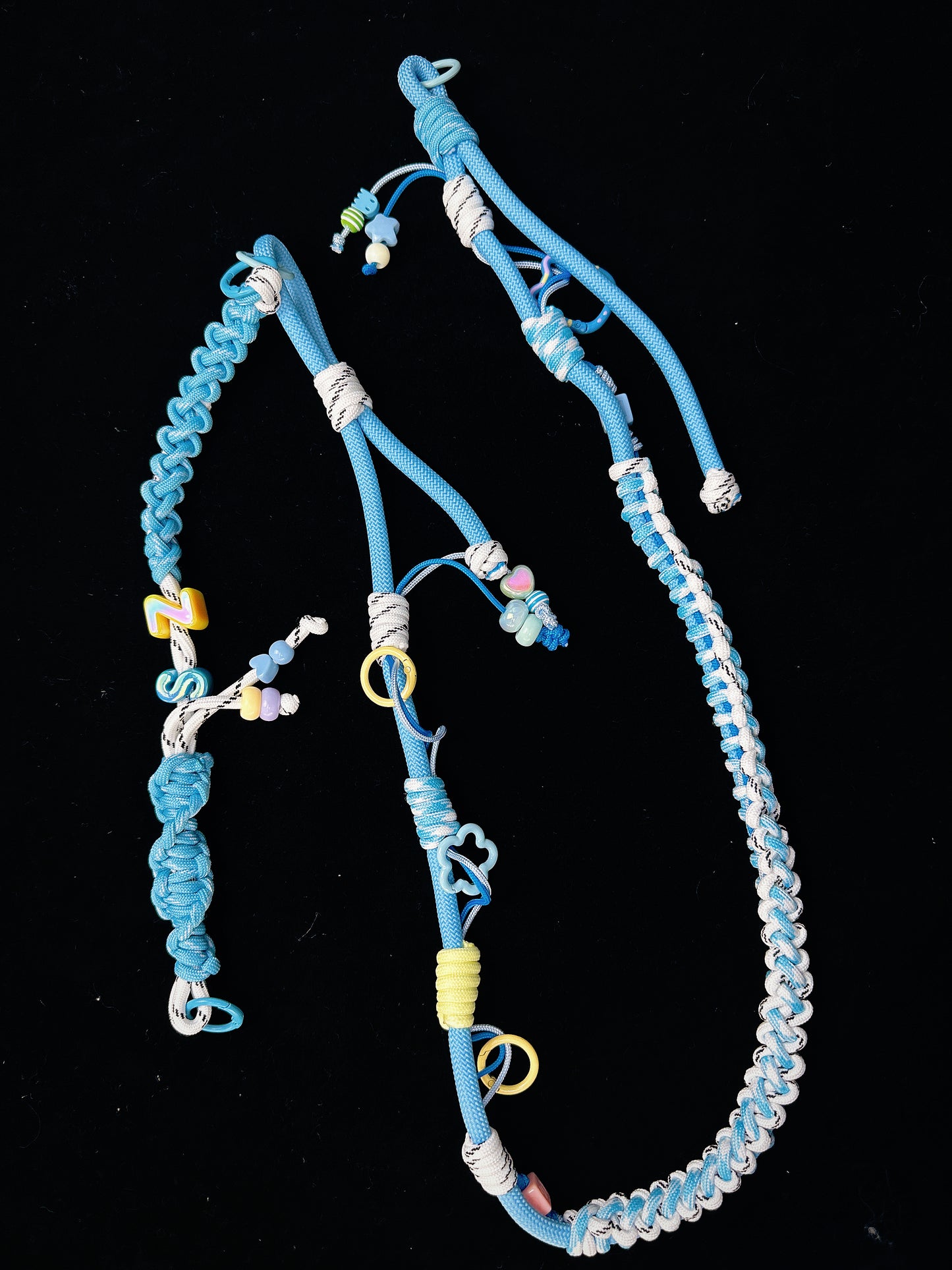 Blue paracord lanyard size reference with coin — SHENG