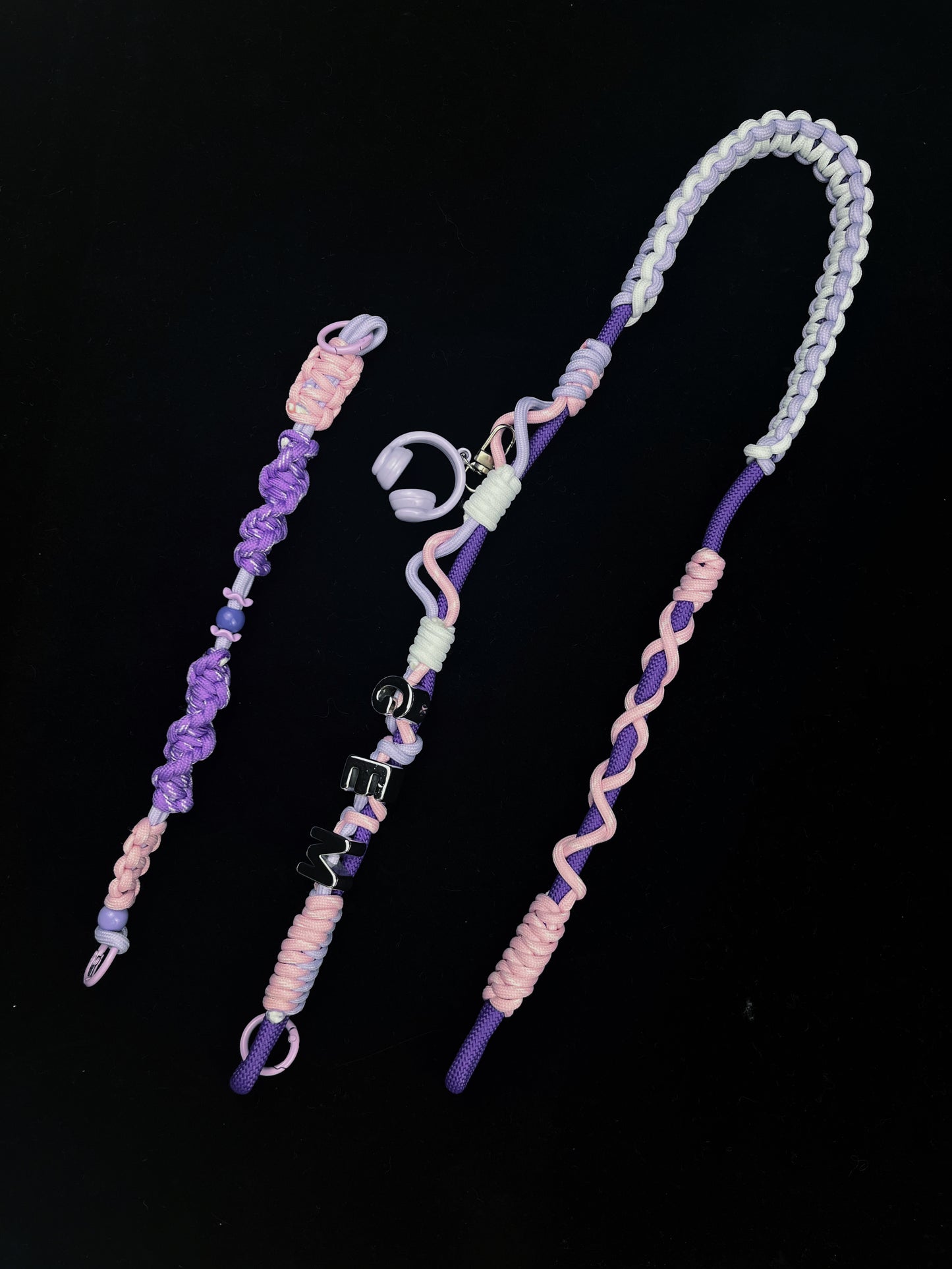 Colorful paracord keychain size reference with coin — SHENG