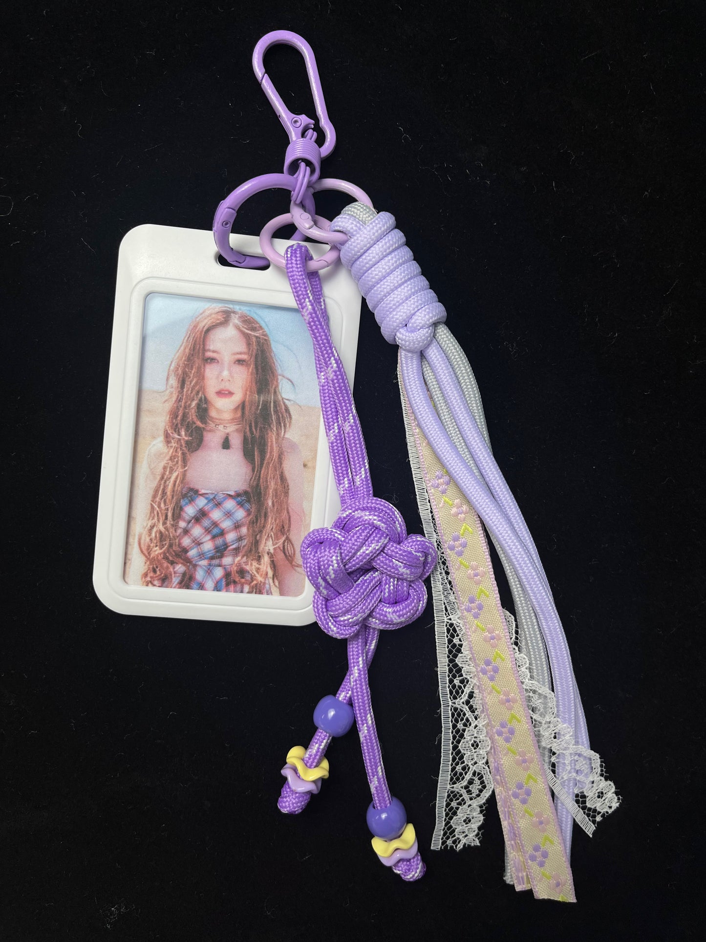 Purple paracord keychain size reference with coin — SHENG