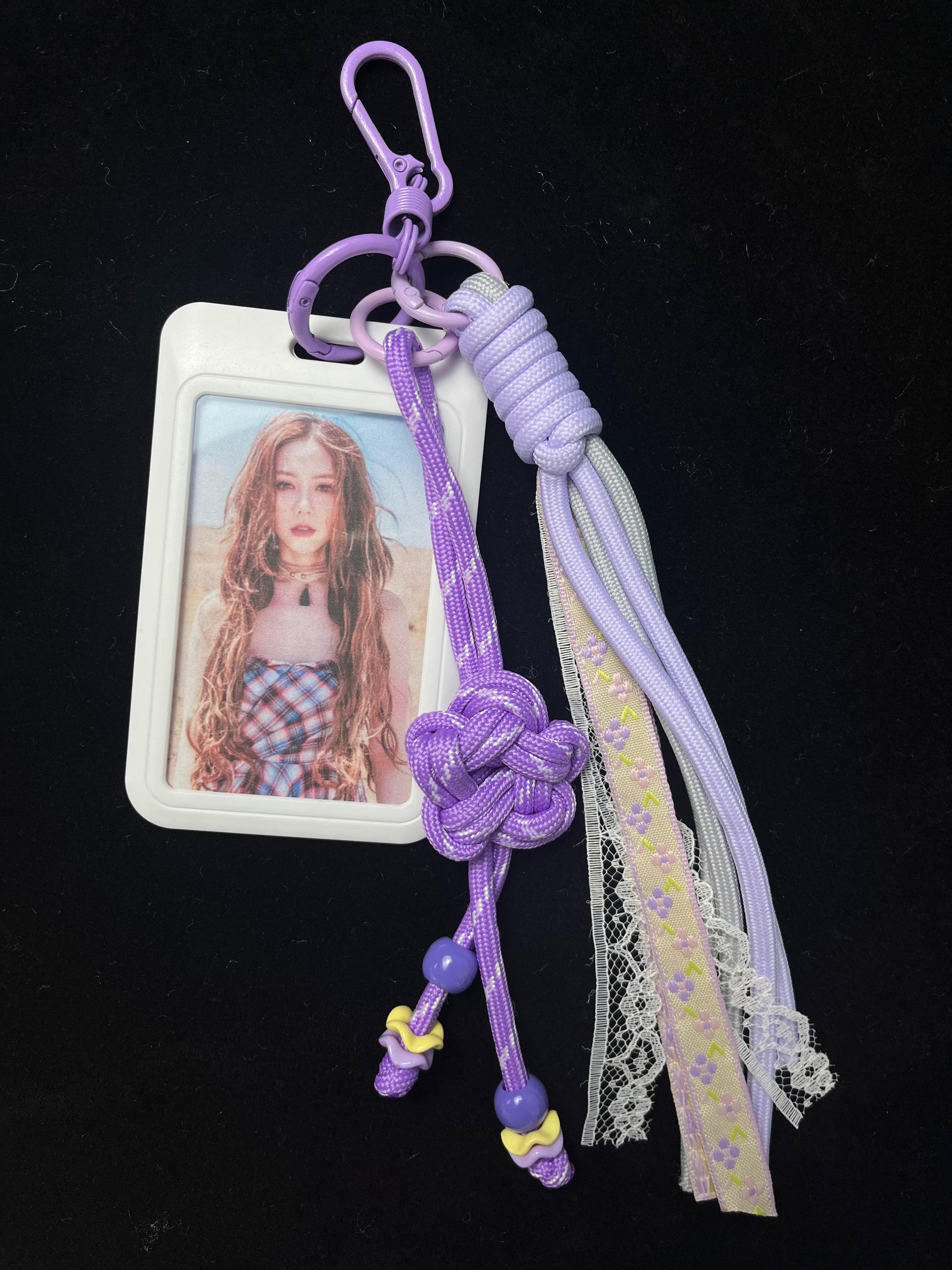 Purple paracord keychain size reference with coin — SHENG