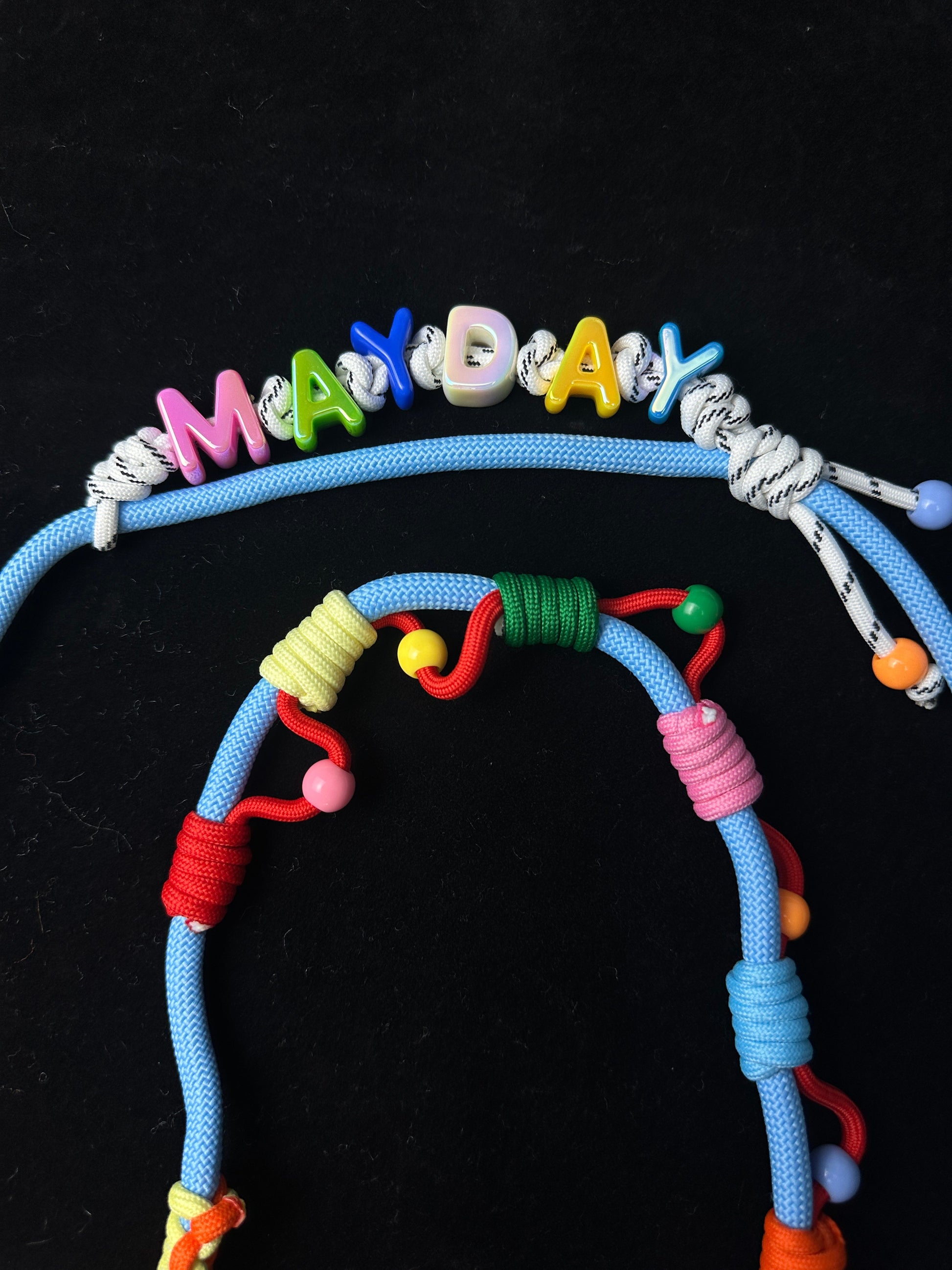 Colorful paracord bracelet size reference with coin — SHENG
